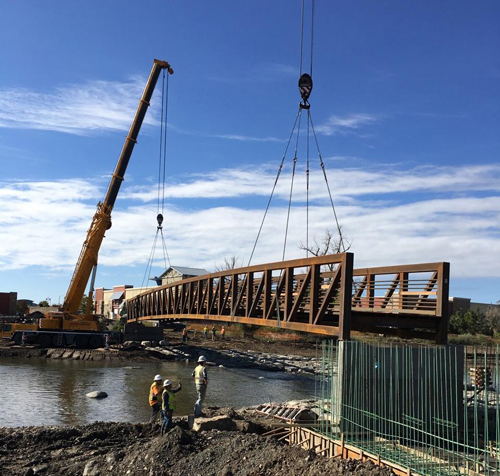 pedestrian bridge installation along St Vrain Creek