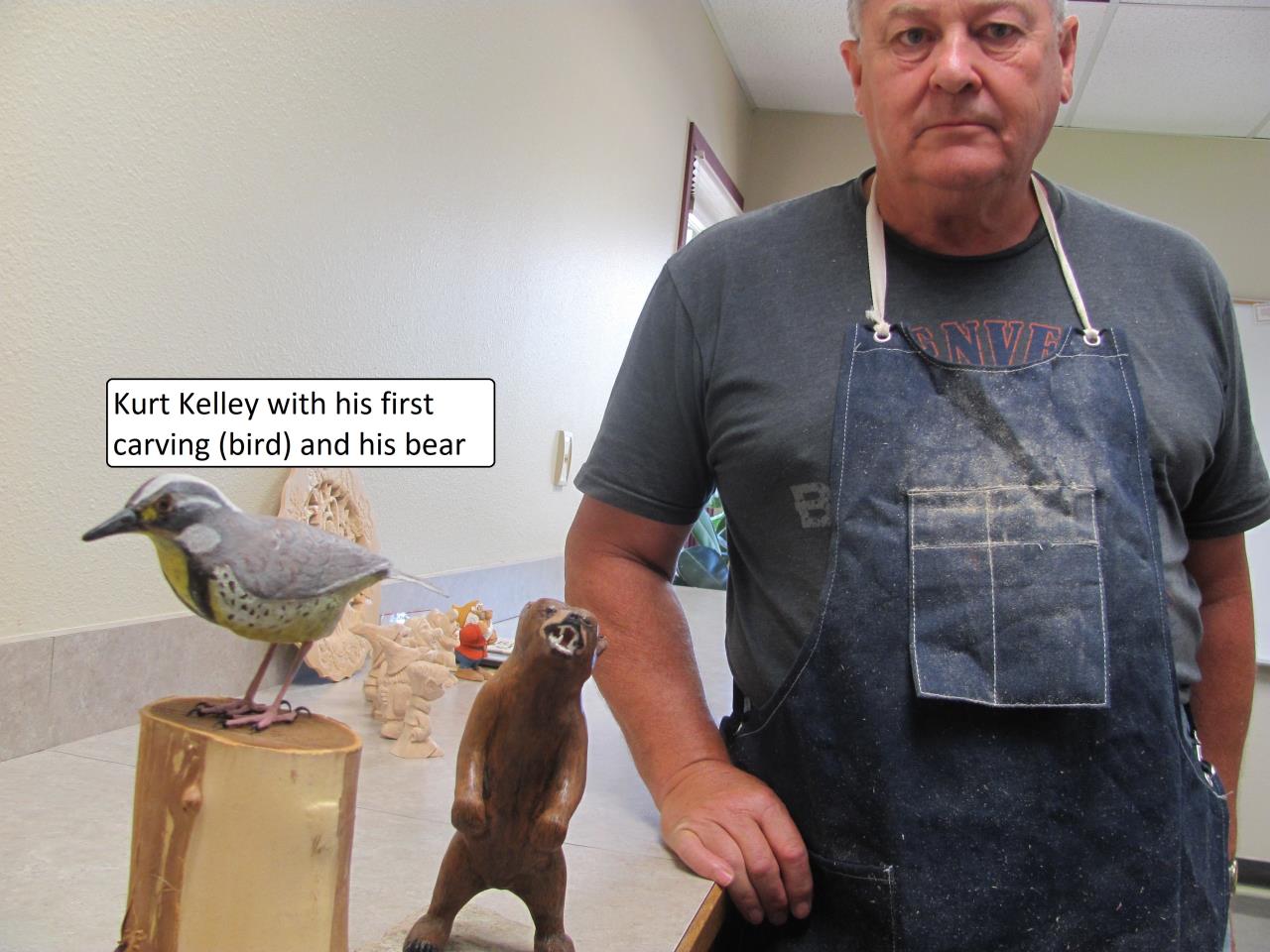 Kurt Kelley with bird carving
