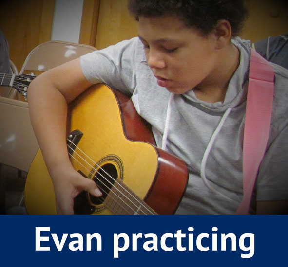 Evan Practicing Guitar