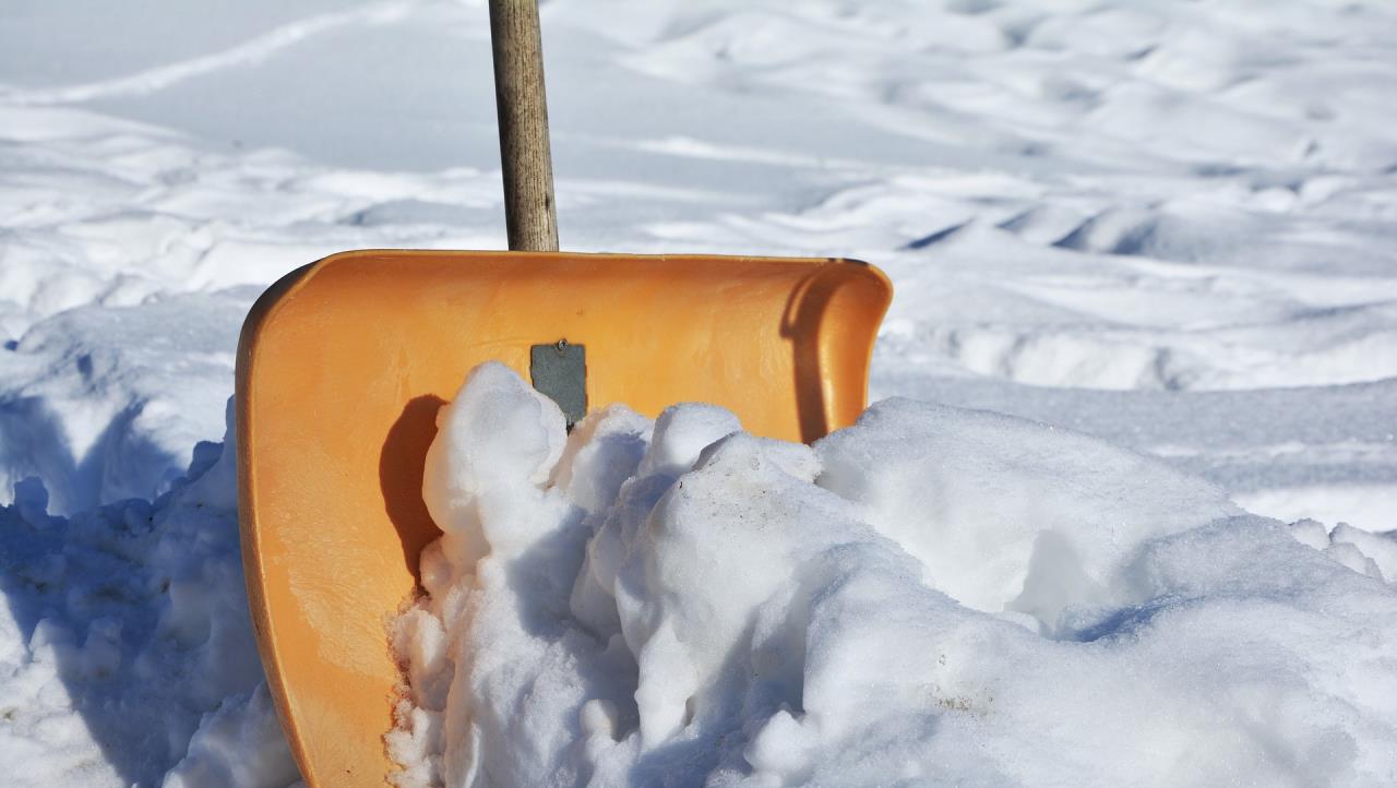 Snow Shovel planted in snow