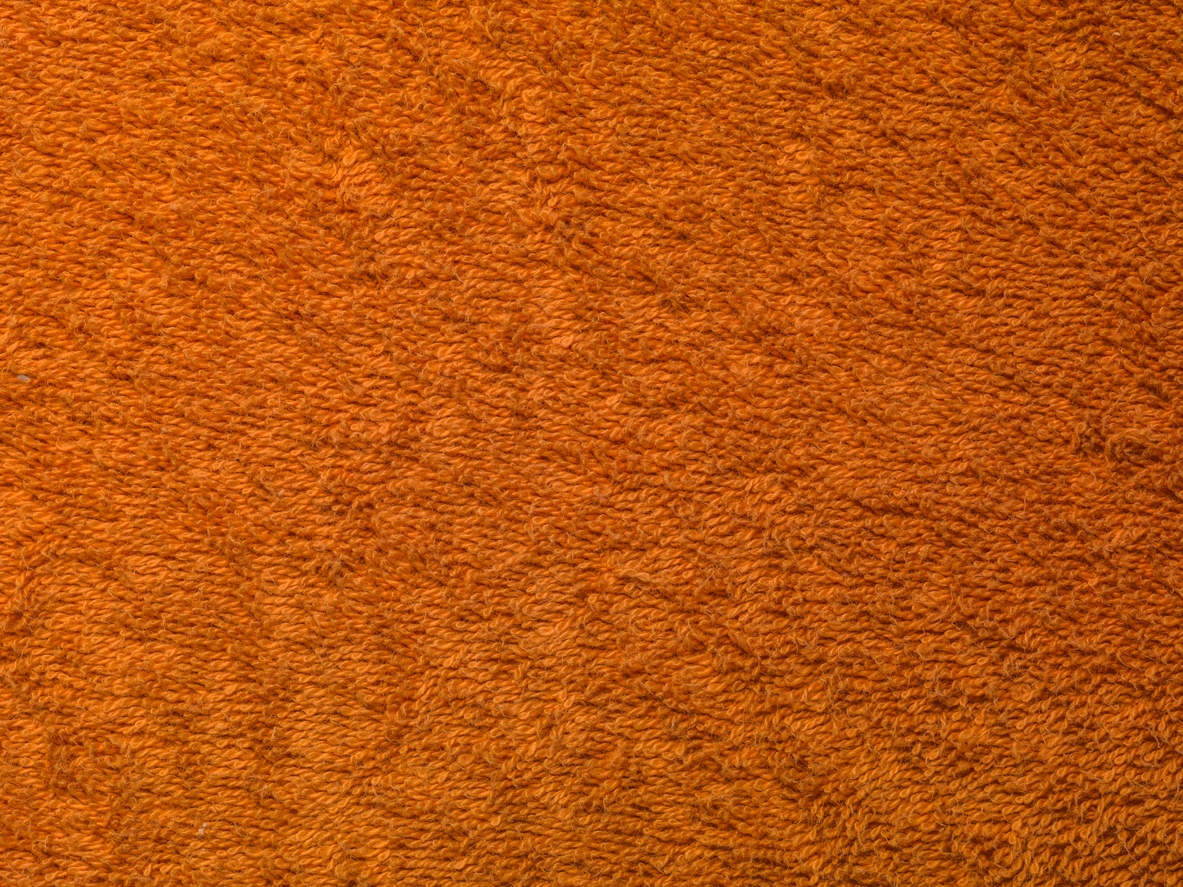 Section of orange shag carpet