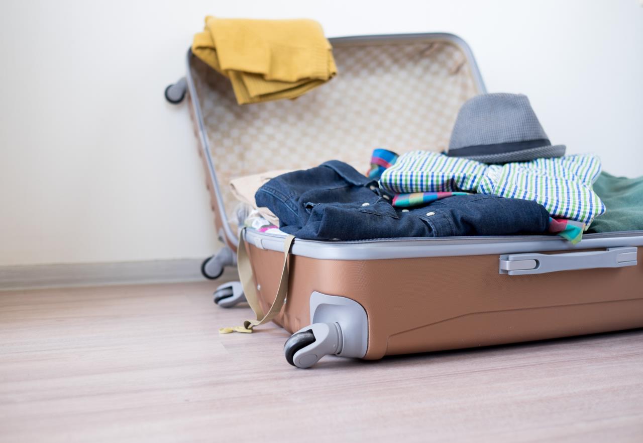 Open Suitcase With Clothing Inside