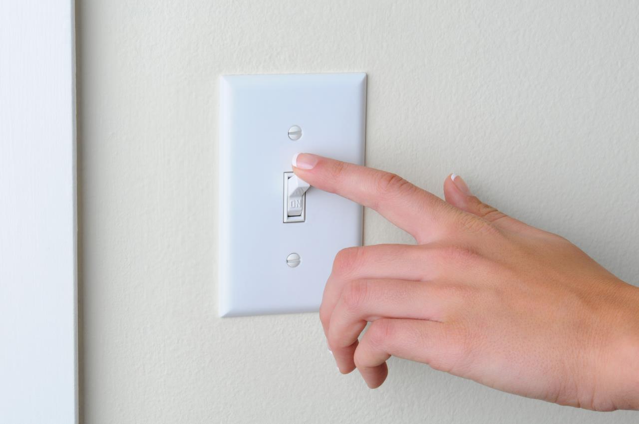 Finger on light switch