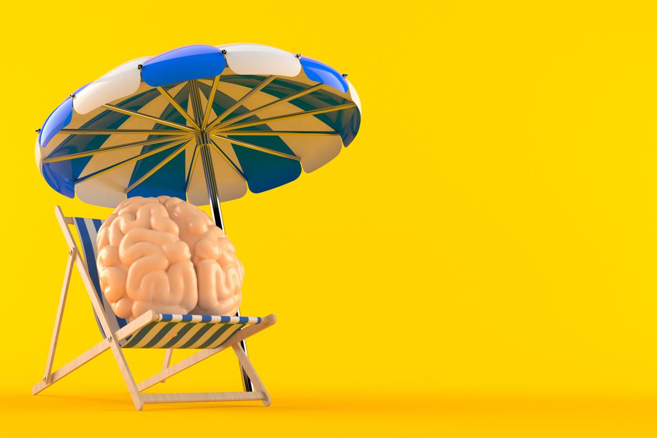 Brain on Beach Chair With Umbrella