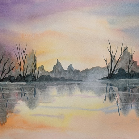 Watercolor painting of tress, mountains reflecting on a lake at sunset