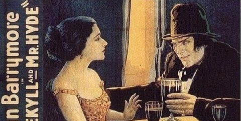 A movie poster for 1920 Jekyll and Hyde showing a man and woman seated at a table