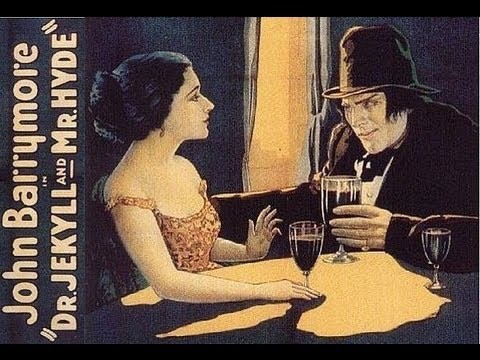 A movie poster for 1920 Jekyll and Hyde showing a man and woman seated at a table