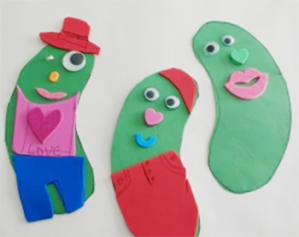 Pickles made of construction paper sport different faces and clothes