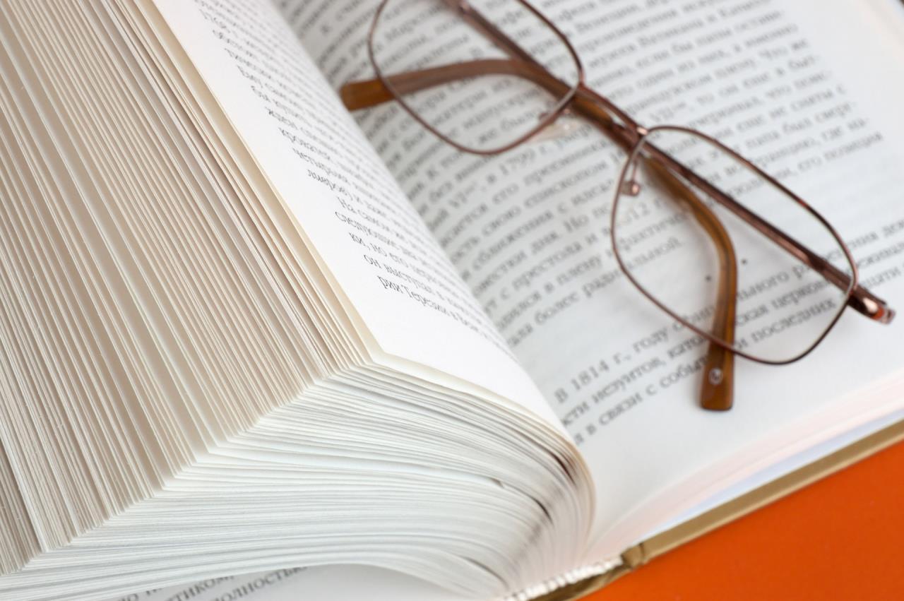 Thick Book With Glasses
