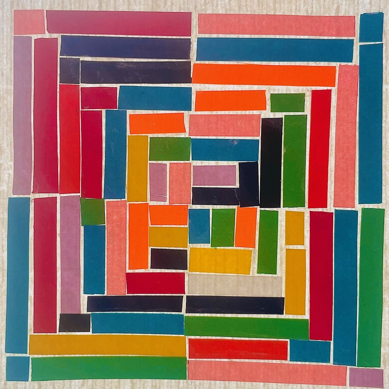 A rainbow colored paper collage inspired by LEGO bricks