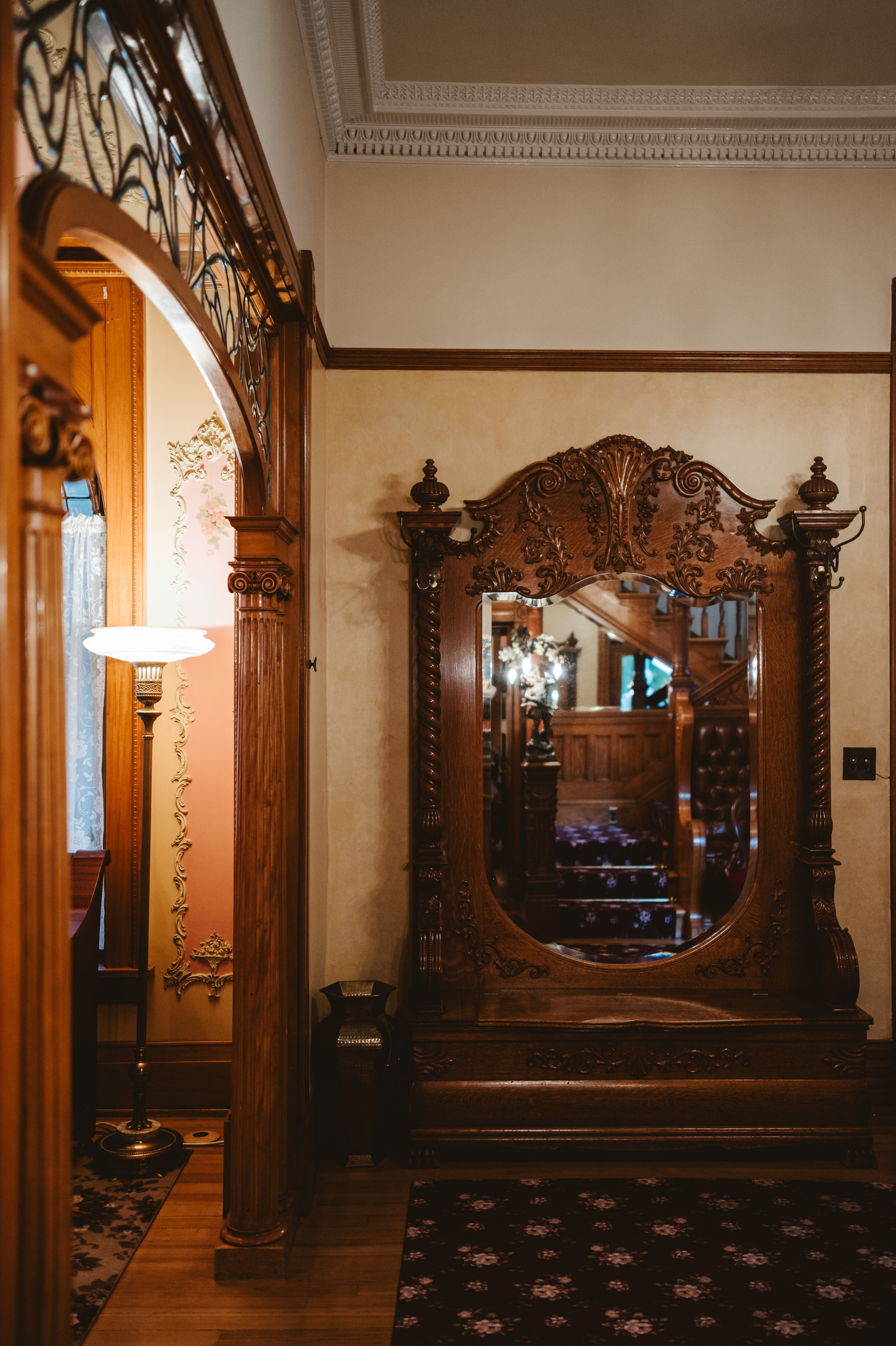 Callahan House foyer featuring large mirrored wardrobe