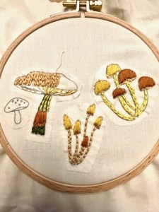 stitched mushrooms on a linen ring