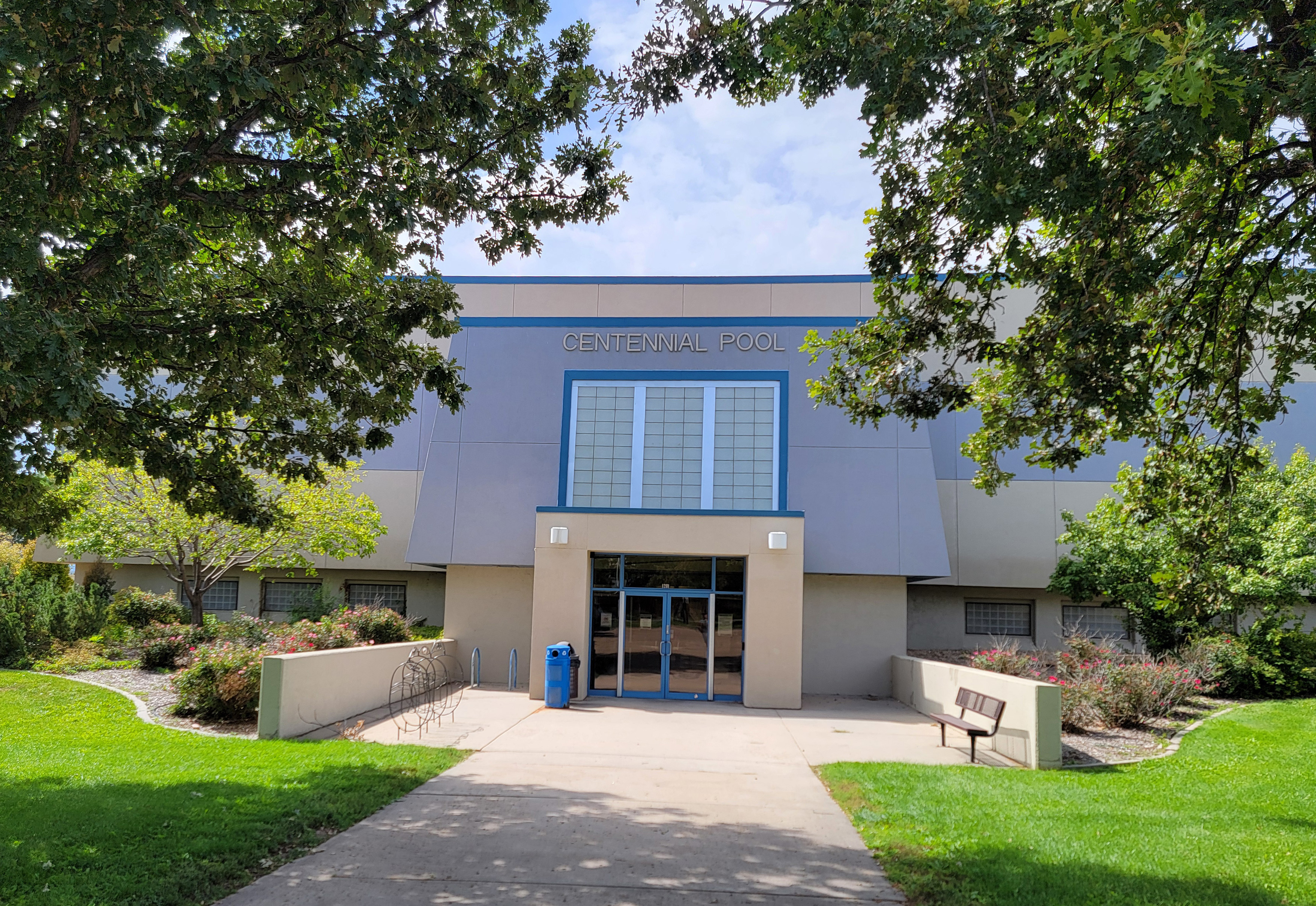 Centennial Pool entrance as viewed from parking lot.