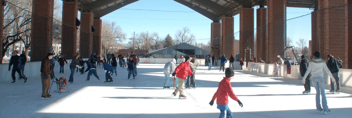 people skating at the outdoor Longmont, CO Ice Pavilion