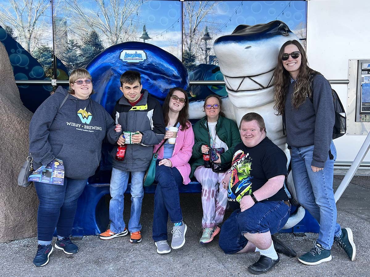 SCOPE participants pose for a group photo outside of the Denver Downtown Aquarium.