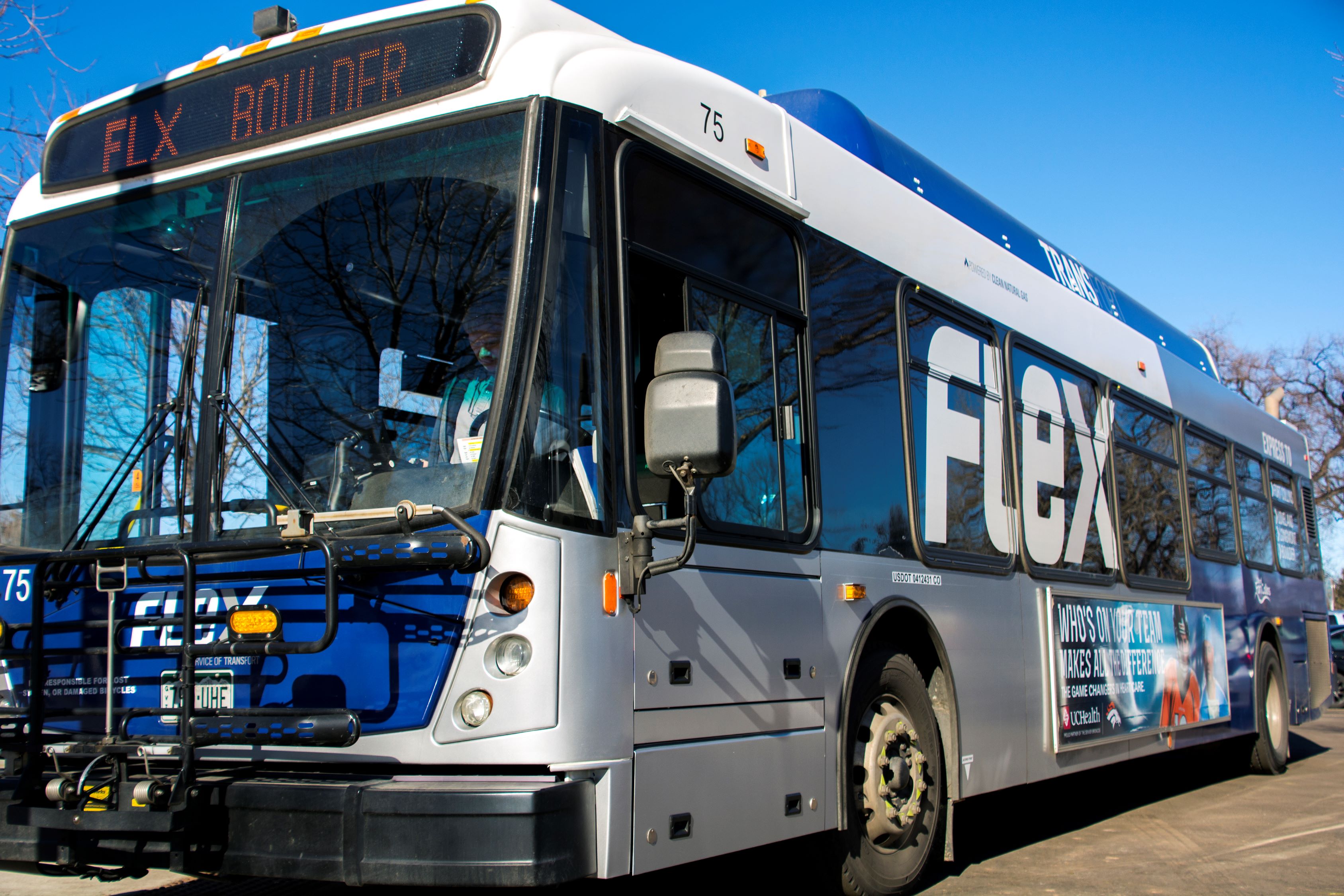 Photo of a FLEX bus with "Boulder" on the digital sign at the front of the bus.