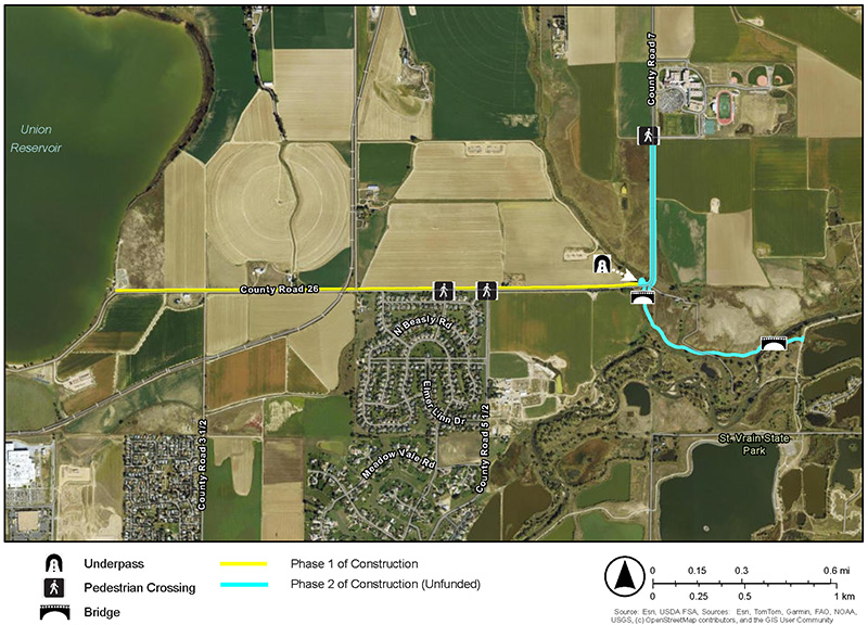 Overview map shows design phases of the WCR (Weld County Regional) 26 Multi-use Trail. Phase 1 runs east/west following Country Road 26 from the east shore of Union Reservoir to County Road 7, with one pedestrian crossing at County Road 5½, and another approximately a quarter mile further west. Phase 2, which is currently unfunded, runs from Mead High School south on County Road 7 to County Road 26, continuing to the east approximately three-quarters of a mile to complete the connection into the SVSP trail system. This second phase will include key features such as an pedestrian crossing at the High School, an underpass at WCR 26, a bridge over the Bar/Kelso Gulch, and a bridge over St. Vrain Creek.