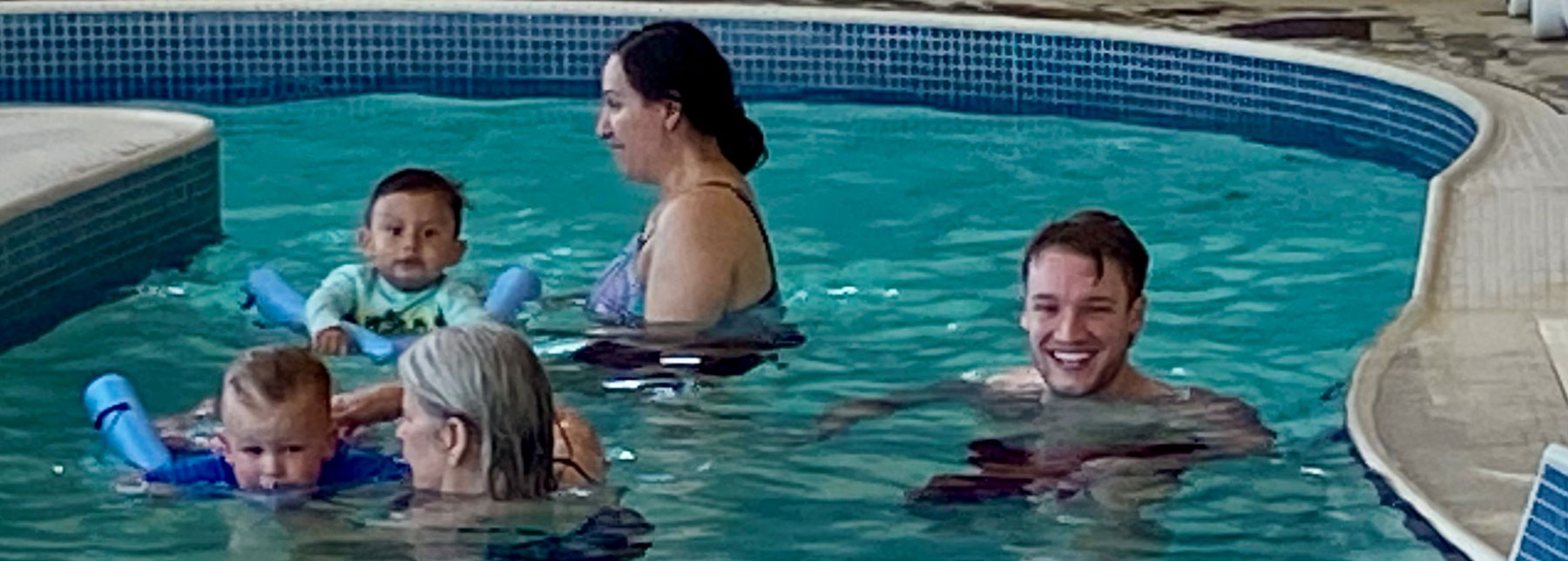 kids and instructors in pool during swim lessons at LRC