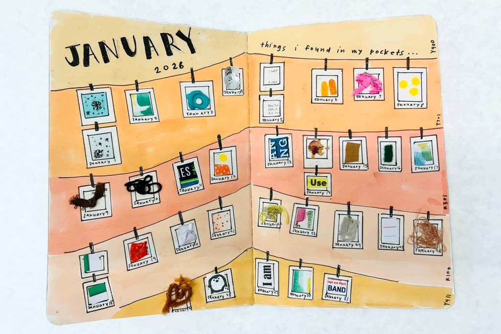 Hand painted junk journal pages featuring artworks hung on a line against a background rendered in shades of orange.