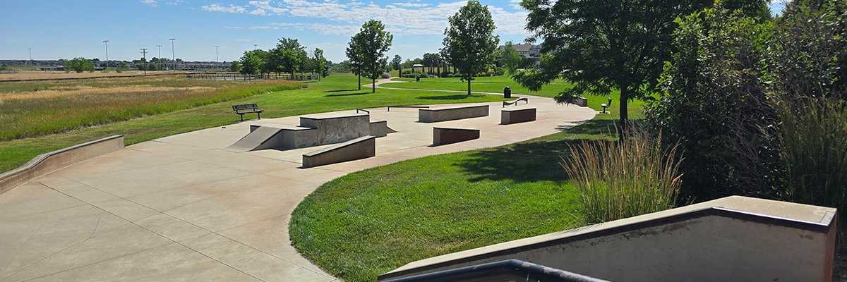 Several ramps and boxes are seen in Longmont's Blue Skies Skate Park.