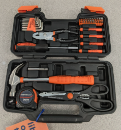 set of tools in a case that are black gray and orange