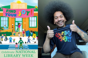a man smiling with thumbs up wearing a tee shirt that says library joy! next to a poster advertising national library week.