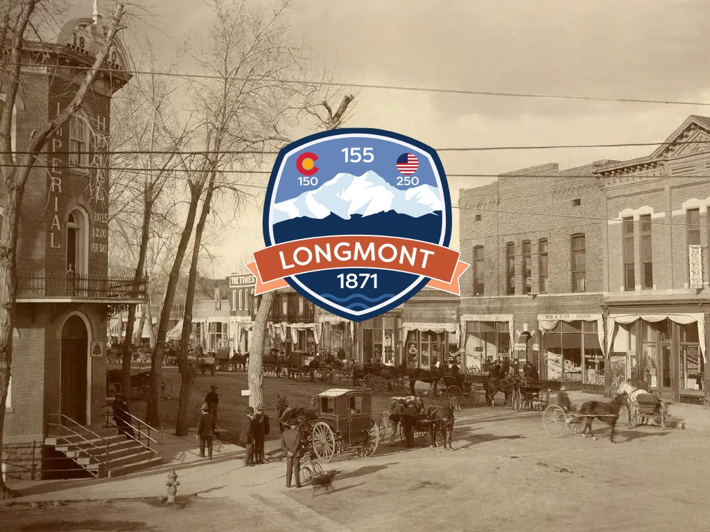 Historical photo of Main Street in Longmont CO with an overlaying logo marking the 155-150 and 250 USA anniversaries in 2026.