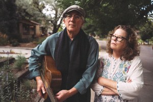 Mollie O'Brien and Rich Moore photographed together in a neighborhood.