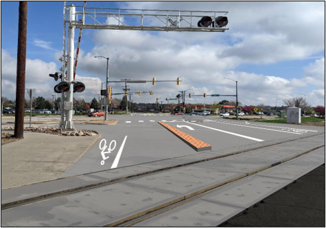 Rendering of the CO 119 and Sunset St. intersection with raised medians and dedicated turn lanes.