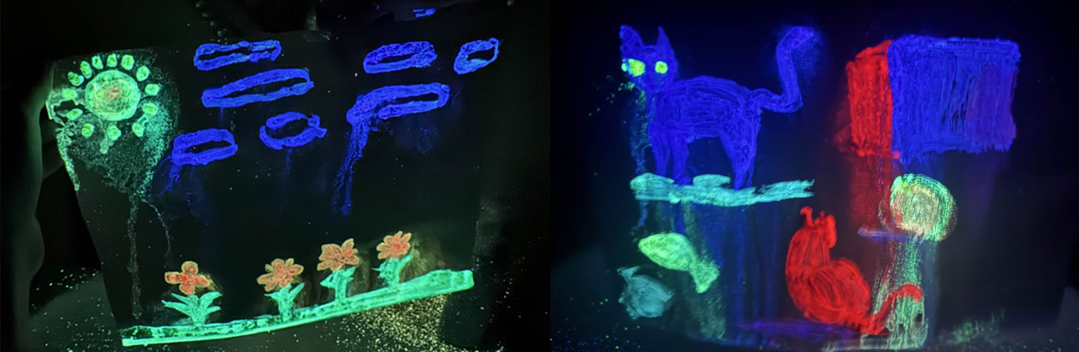 a close up of a painting done by a child using glow in the dark paint.