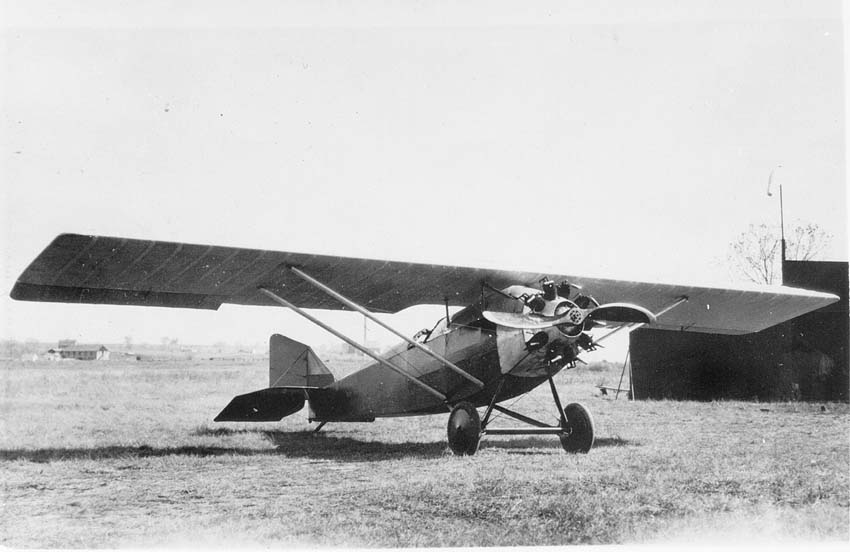 This is a black and white print of an airplane. On the back in pencil: "Gene Miller's Plane, Longmont. Made by him." In ink on the back is written: "Plane built by Gene Miller."