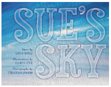 Cover of a book witih blue and white design and words Sue's Sky