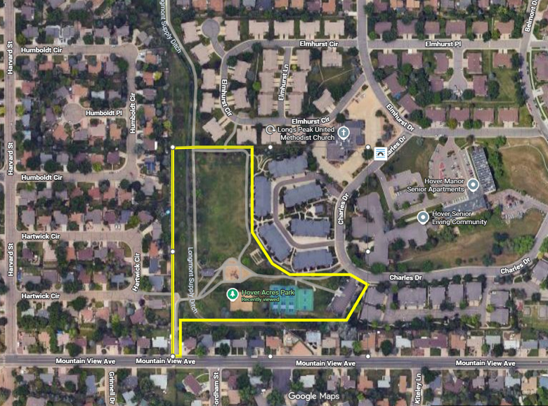 Aerial map of Hover Acres Park in Longmont, Colorado. A yellow outline marks an L shape of the park and project area, which is bordered by Mountain View Avenue to the south and residential neighborhoods to the west and north. Charles Drive borders the park to the east. The Longmont Supply Ditch runs through the west side of the project. The map is bordered by Harvard Street, running north and south on east edge, and Mountain View Avenue running east west on the south edge of the map. Also seen east of the project are the Hover Senior Living Community and the Elmhurst City Park United Methodist Church.
