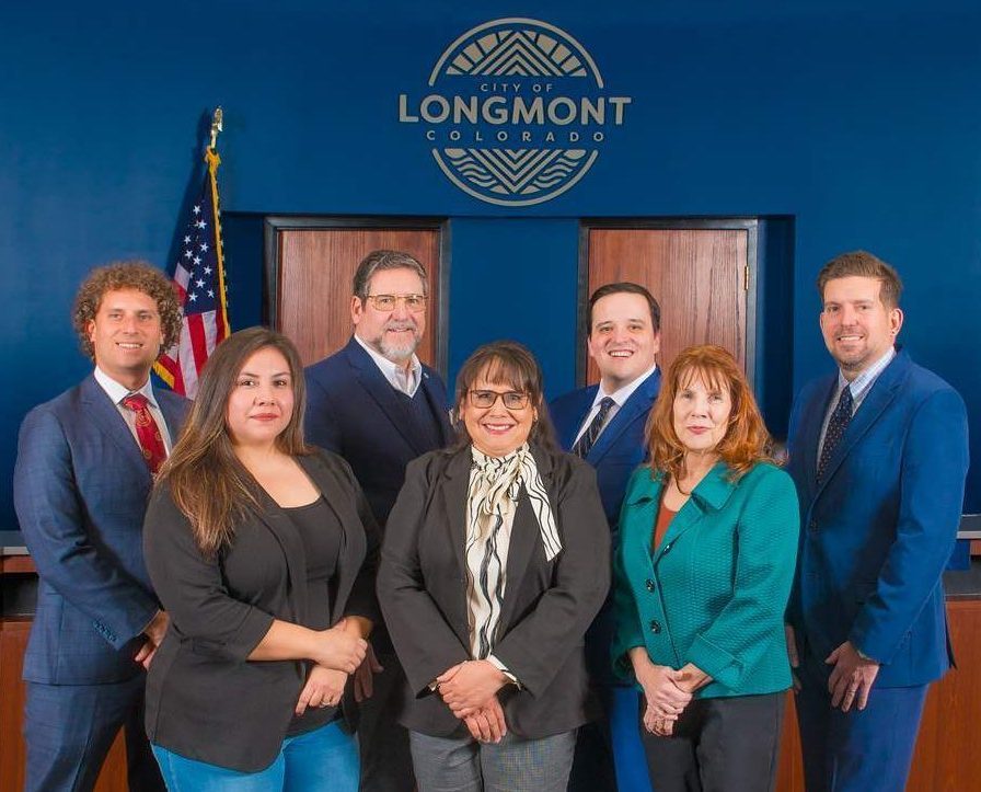 Longmont City Council in the Council Chambers, from left to right: Matthew Popkin, Sean McCoy, Jake Marsing, Alex Kalkhofer, Crystal Prieto, Susie Hidalgo-Fahring, Diane Crist