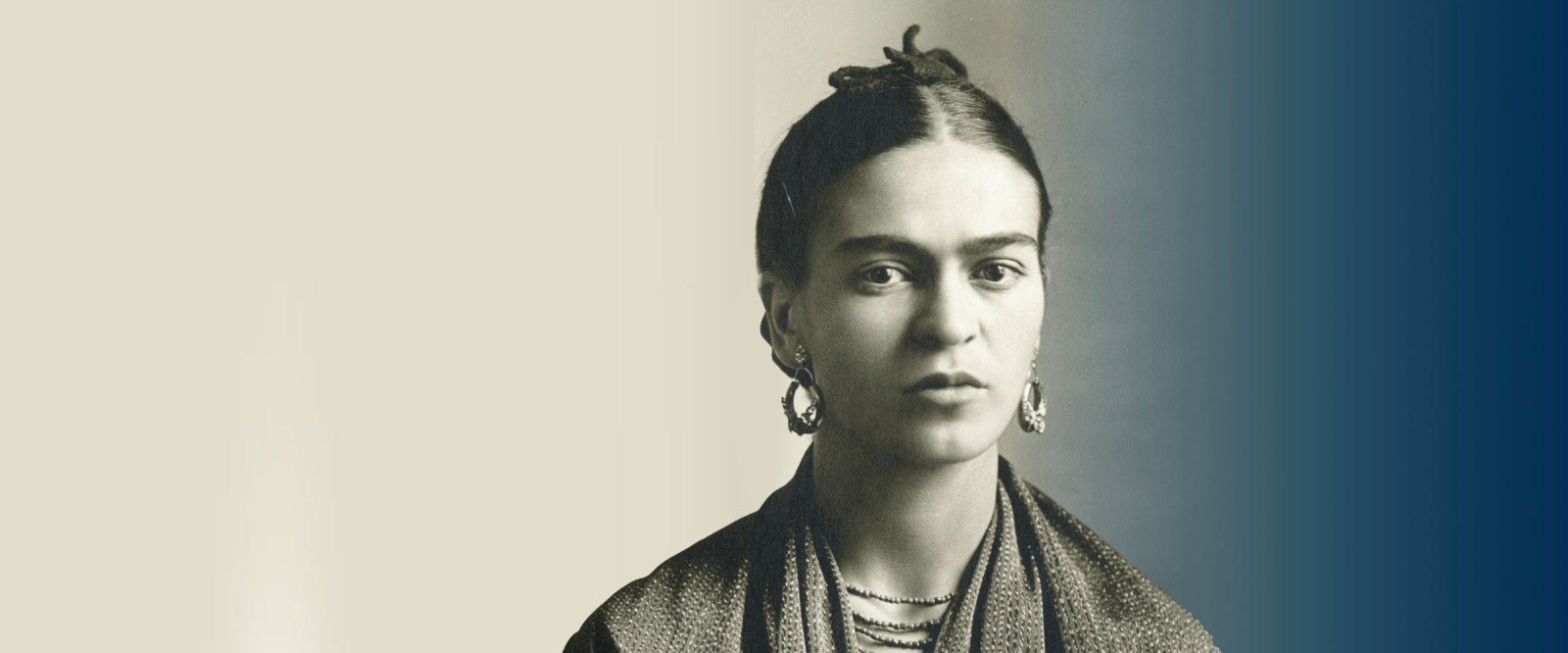 an image of artist Frida Kahlo against a blue and grey background