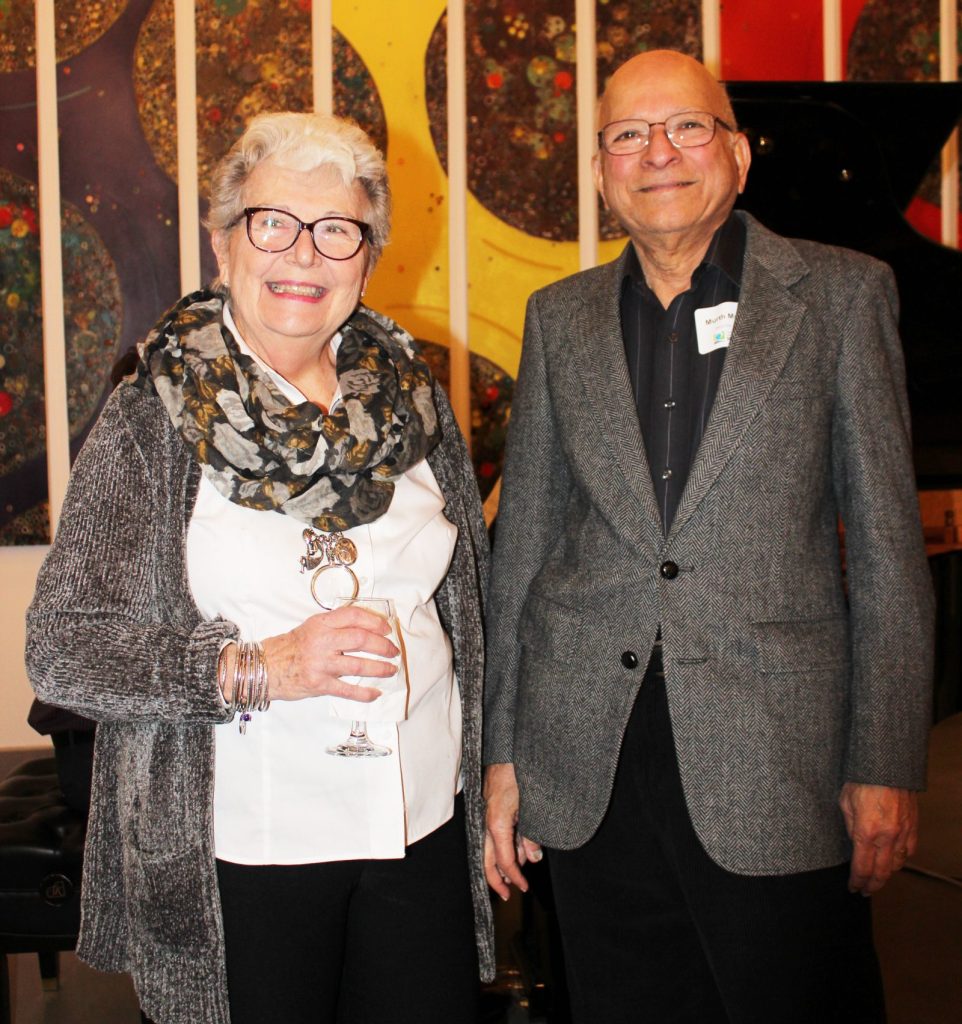 Two people posing for a photo